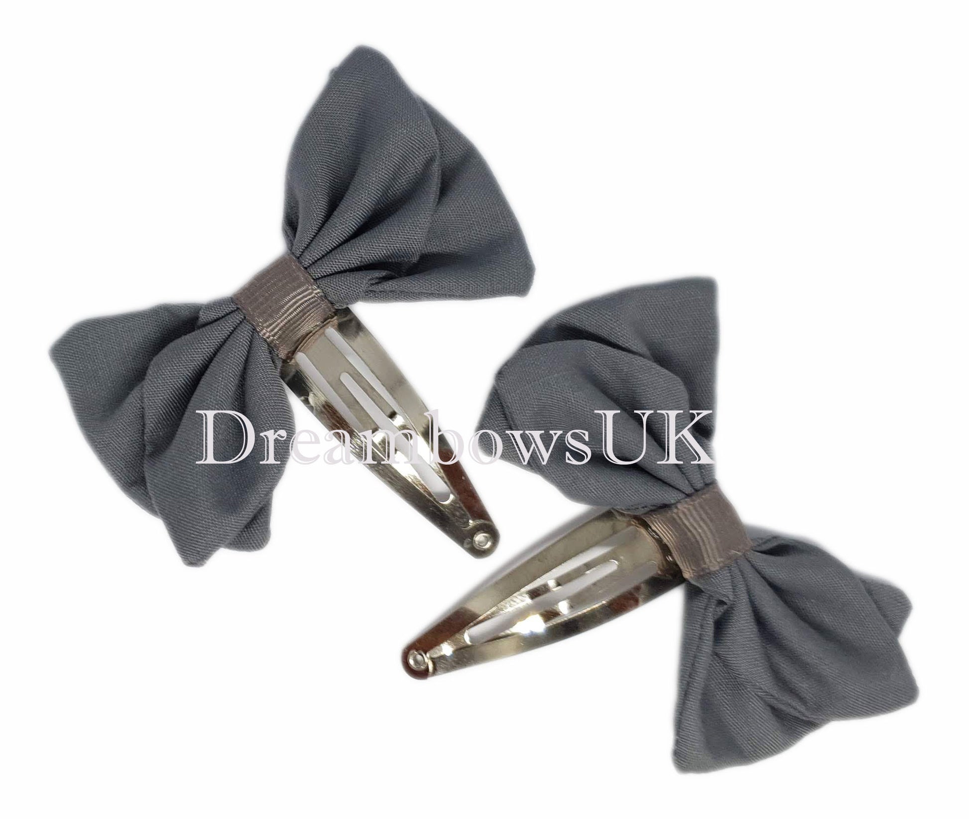 Girls school bows on snap clips