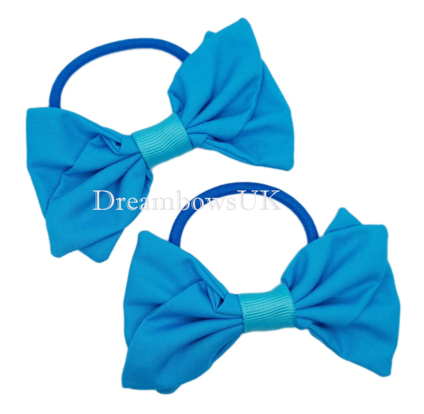 Girls turquoise fabric hair bows on thick hair elastics