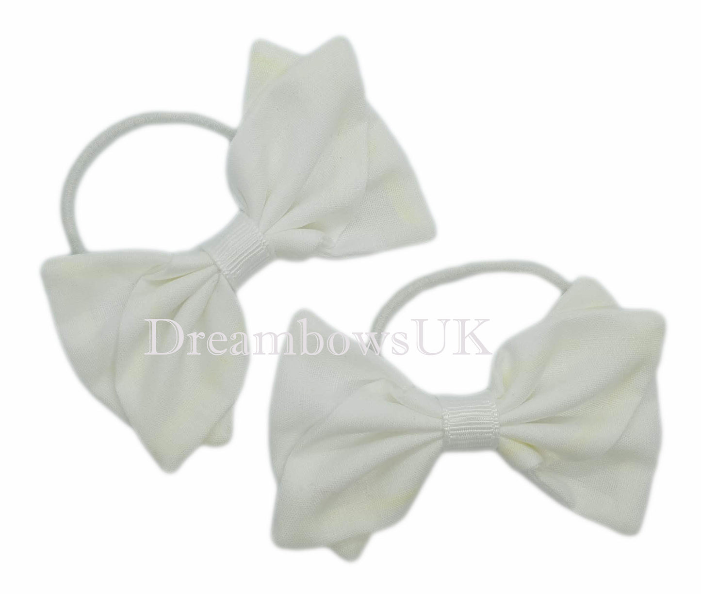 White fabric hair bows on thin hair ties