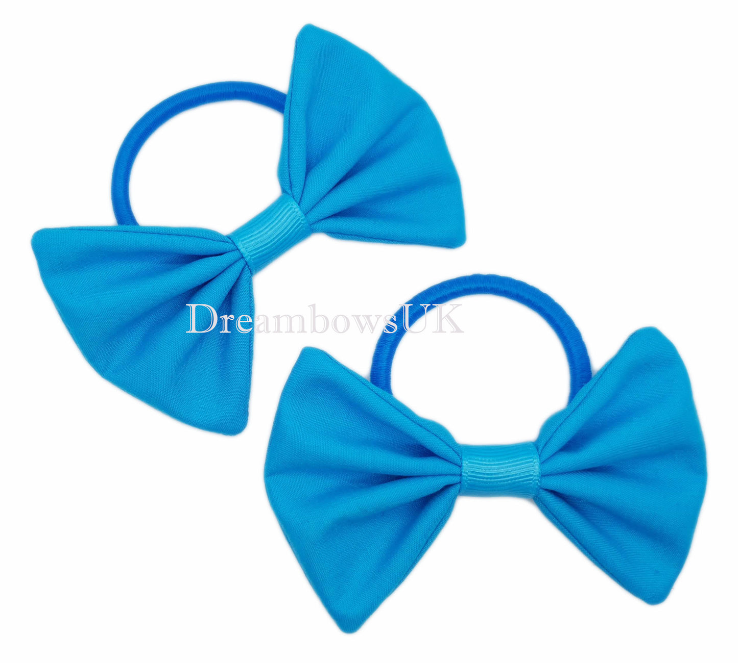 Turquoise fabric hair bows on thick bobbles