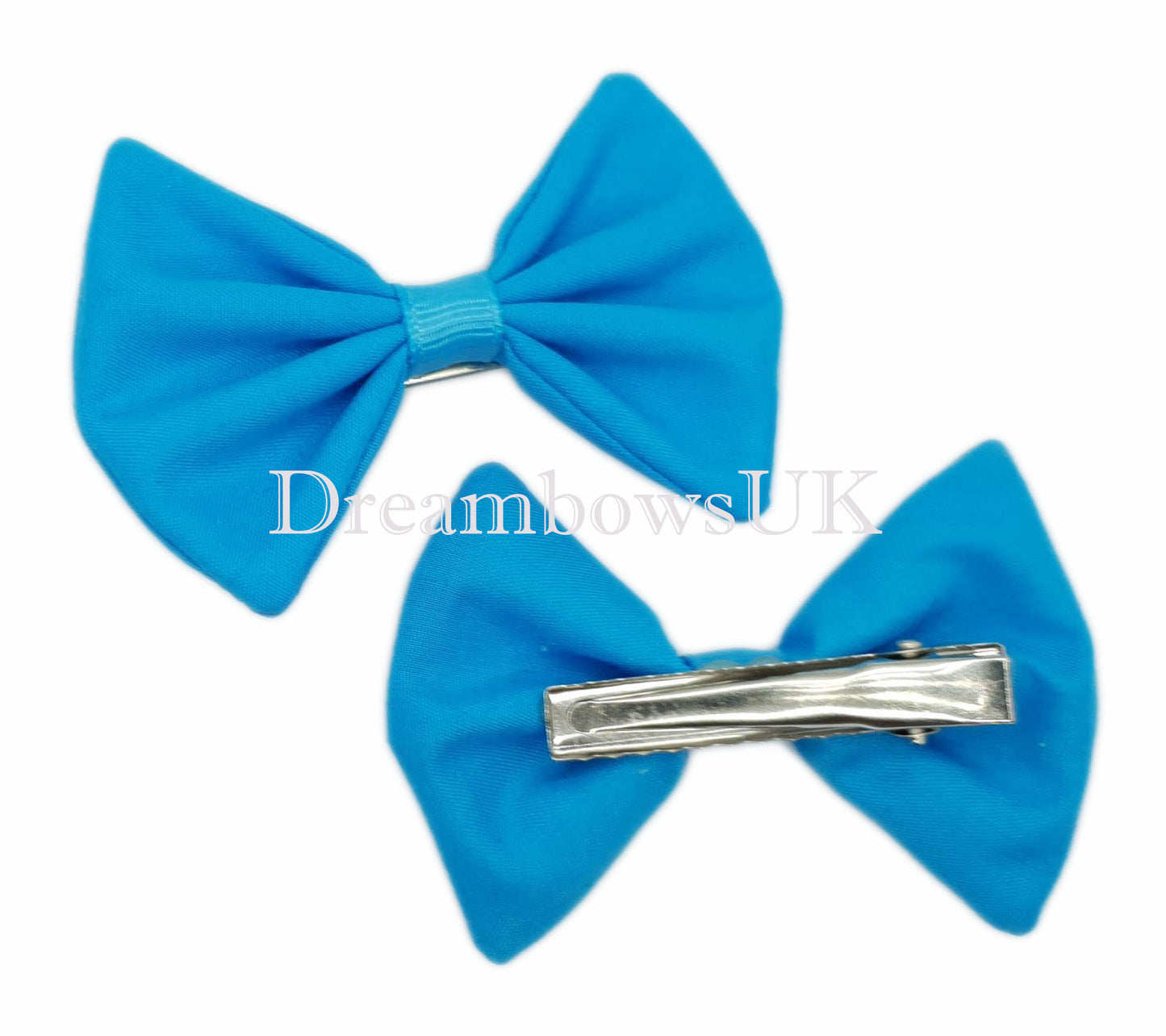 Turquoise fabric hair bows on alligator clips