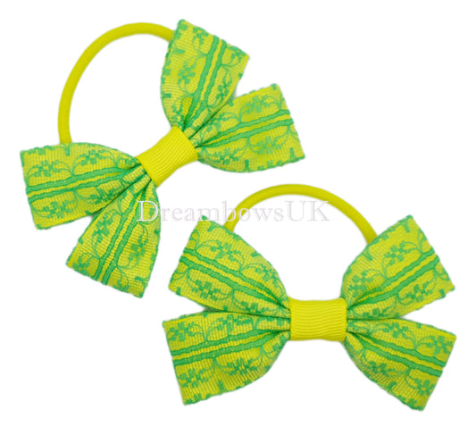 Green and yellow lace bows on thick bobbles