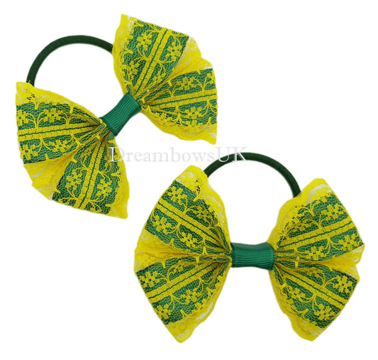 Bottle green and golden yellow lace bows on thick bobbles