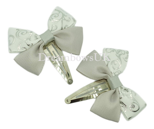 Silver and white hair bows, snap clips