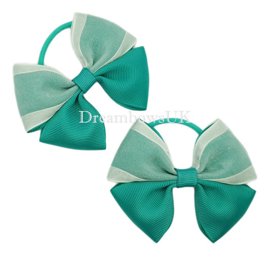 Jade green and white school bows,