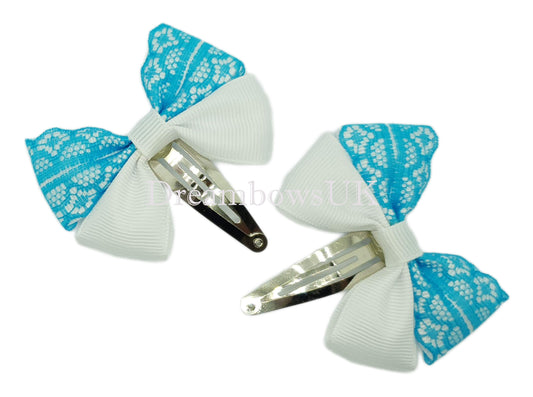 Turquoise and white lace hair bows on snap clips