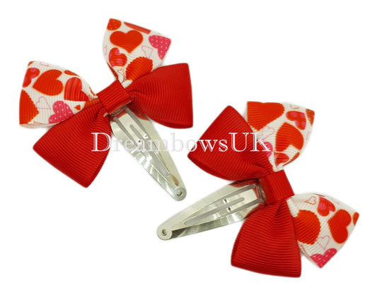 Red and white hearts design hair bows on snap clips