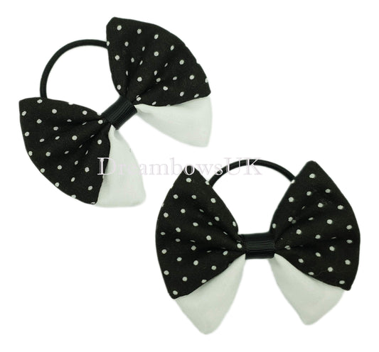 Black and white polka dot hair bows on thin bobbles