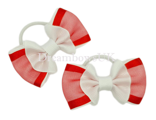 Red and white organza hair bows on thin bobbles