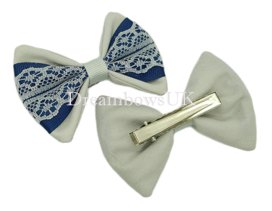 Navy blue and silver lace hair bows on alligator clips