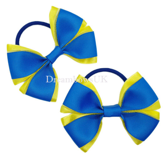 Royal blue and yellow organza hair bows on thick bobbles