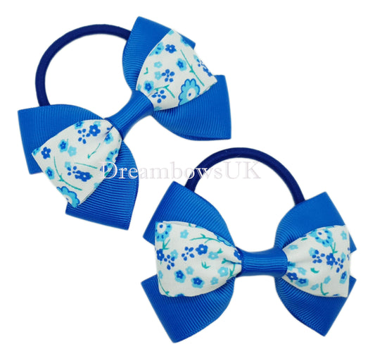 Royal blue and white floral hair bows on thick bobbles