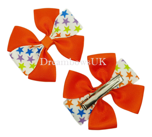 Orange and Colourful Stars Design Hair Bows on Alligator Clips – Pair (7cm x 5cm)