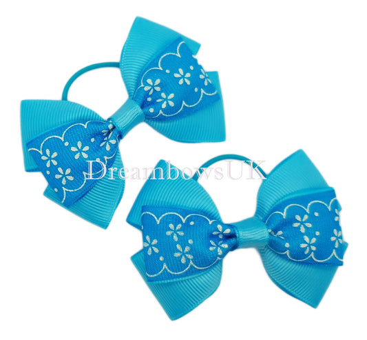 Turquoise hair bows on thin bobbles