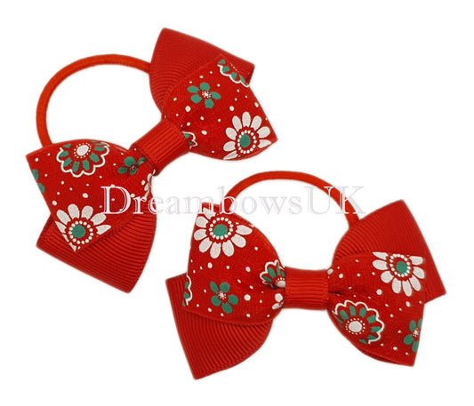 Red floral hair bows on thin bobbles