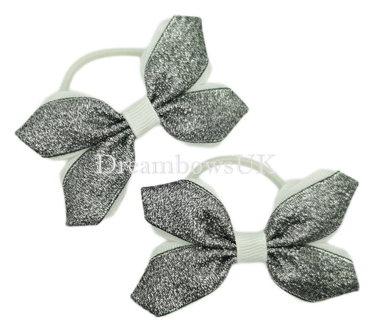 Black and white glitter hair bows on thin bobbles