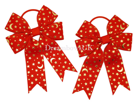 Red and gold star design hair bows on thin bobbles