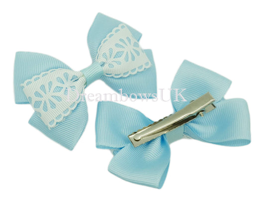 Baby blue and white floral hair bows on alligator clips