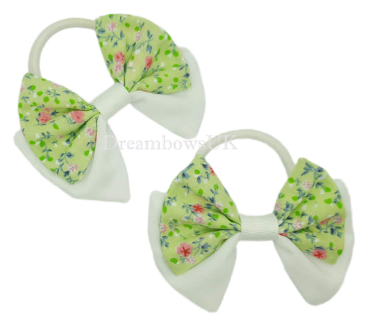 Lime green and white floral hair bows on thick bobbles