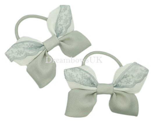Silver and white lace hair bows on thick bobbles 
