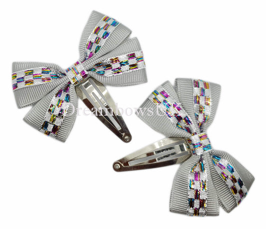 Silver hair bows on snap clips