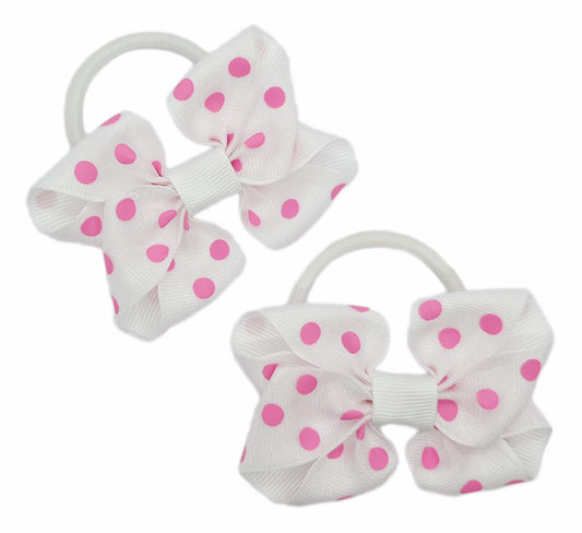 Pink polka dot hair bows on thick bobbles