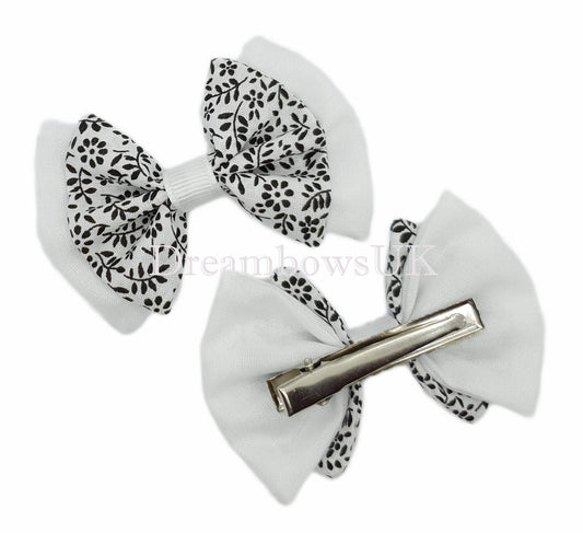 Black and white floral hair bows on alligator clips