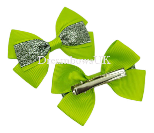 Lime green and black glitter hair bows on alligator clips