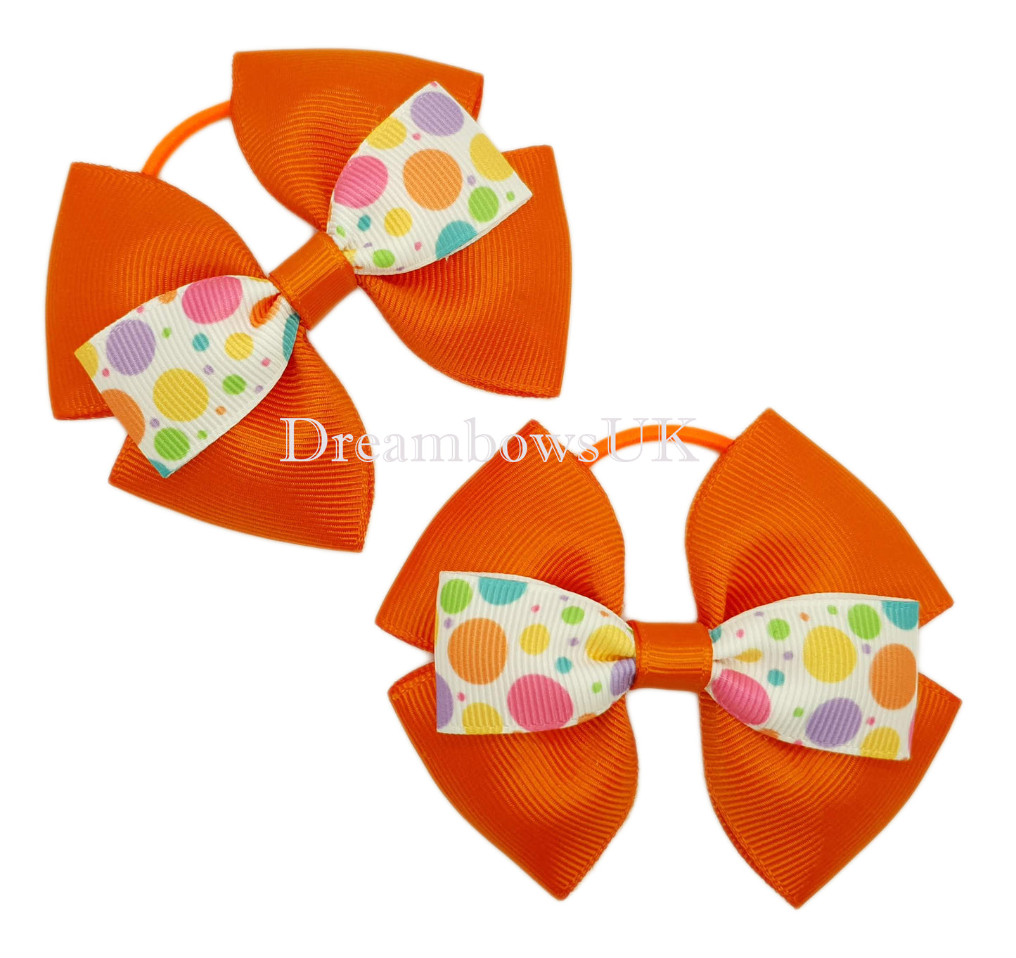 Orange hair bows on thin bobbles