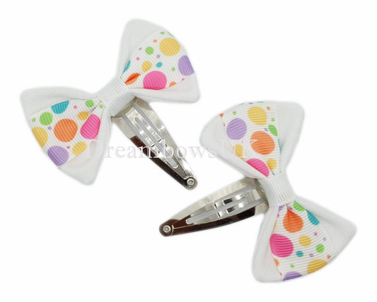 Spotty hair bows, snap clips