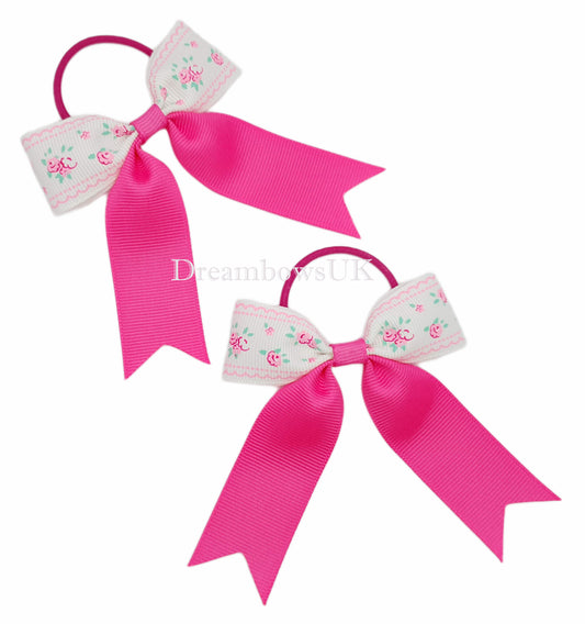Hot pink and white floral hair bows on thin bobbles