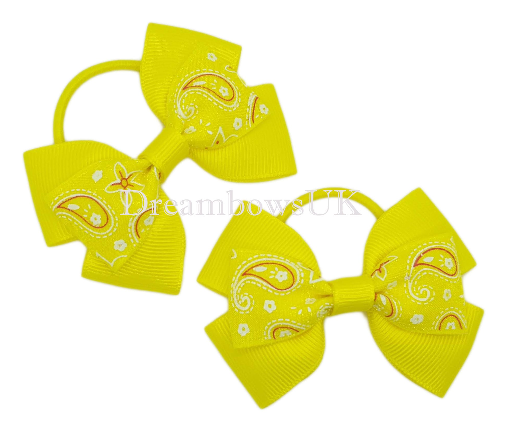 Yellow paisley hair bows on thin bobbles