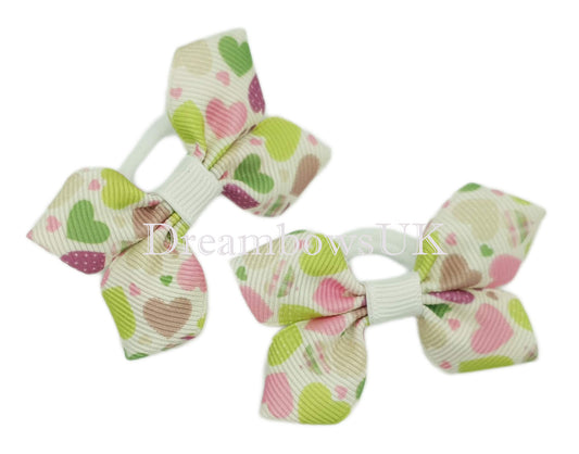 Hearts design bows on soft polyester bobbles