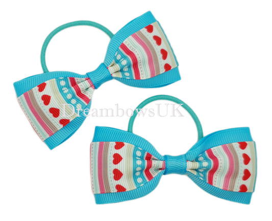 Turquoise novelty hair bows on thin bobbles