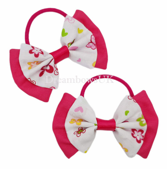 Cerise pink and white floral hair bows on thick bobbles