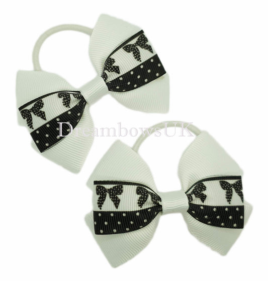 Black and white novlety design hair bows on thin bobbles