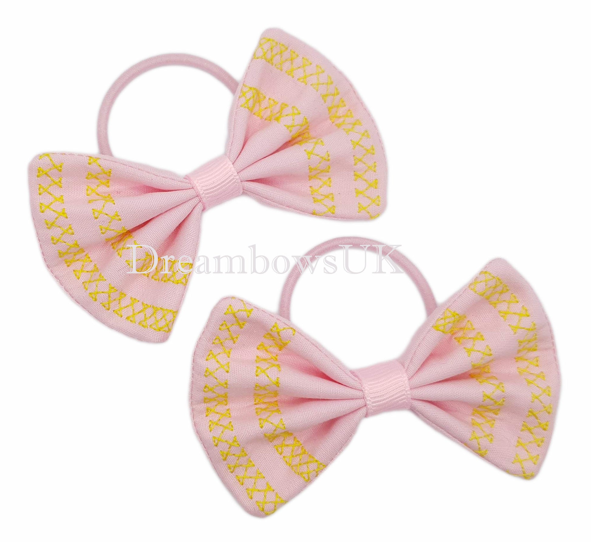 Embroidered hair bows on thin bobbles