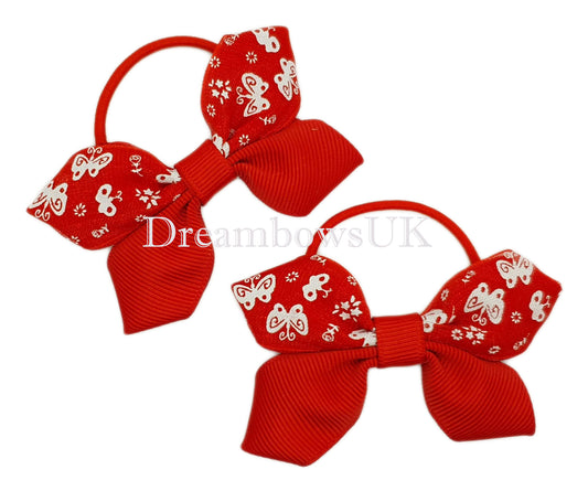 Red butterfly design hair bows on thin bobbles