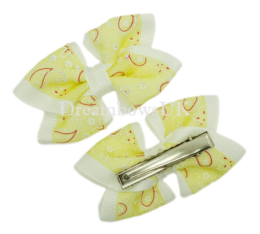 Yellow and white hair bows, alligator clips