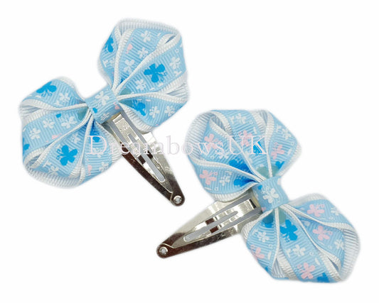 Baby blue and white butterfly design hair bows on snap clips