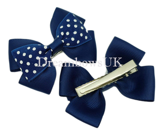 Navy blue polka dot hair bows on alligator clips