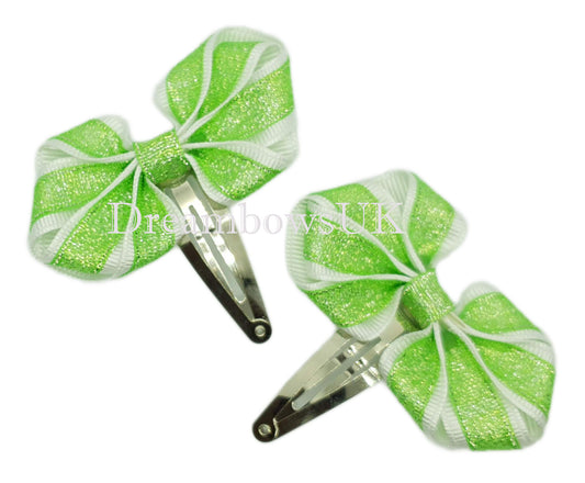 Lime green and white glitter bows on snap clips