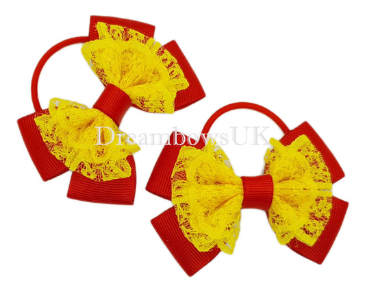 Red and yellow school bows on thin bobbles