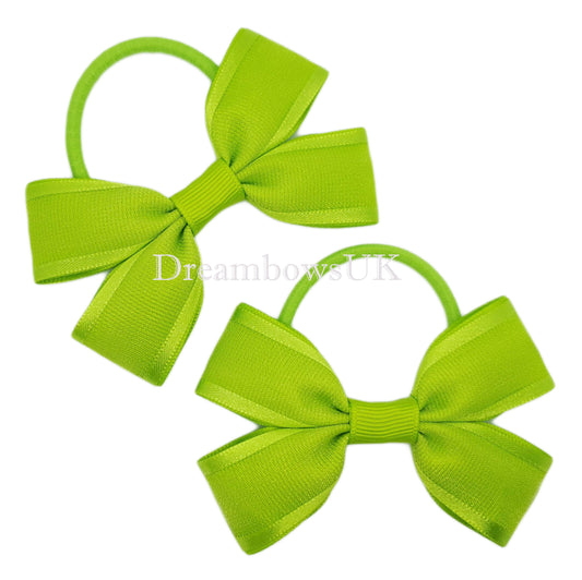 Lime green organza hair bows on thick bobbles