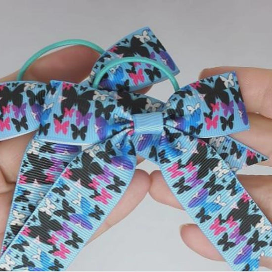 Blue and Black Butterfly Design Hair Bows on Thin Bobbles