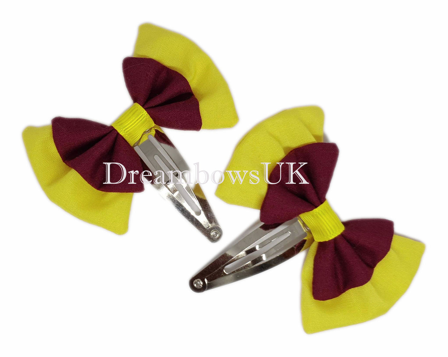 2x Burgundy and yellow fabric hair bows