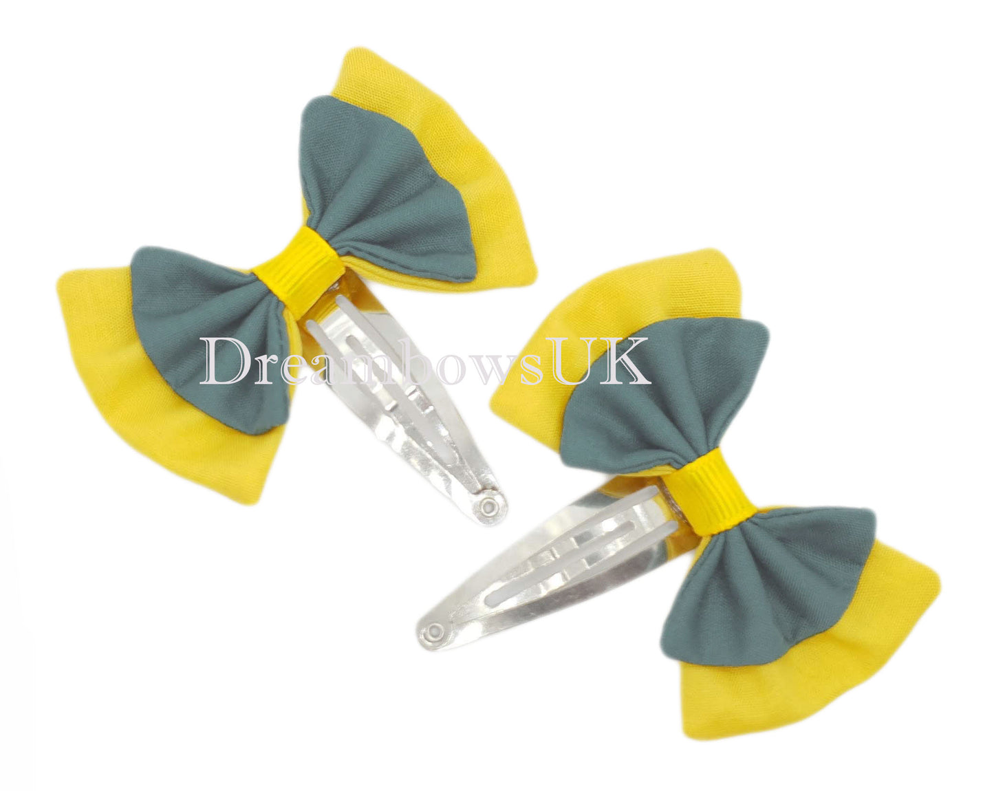 2x Grey and golden yellow fabric hair bows