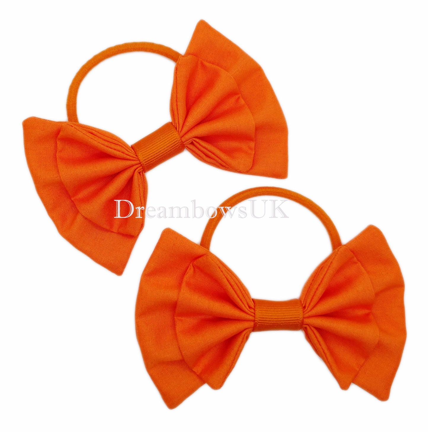 2x Orange fabric hair bows