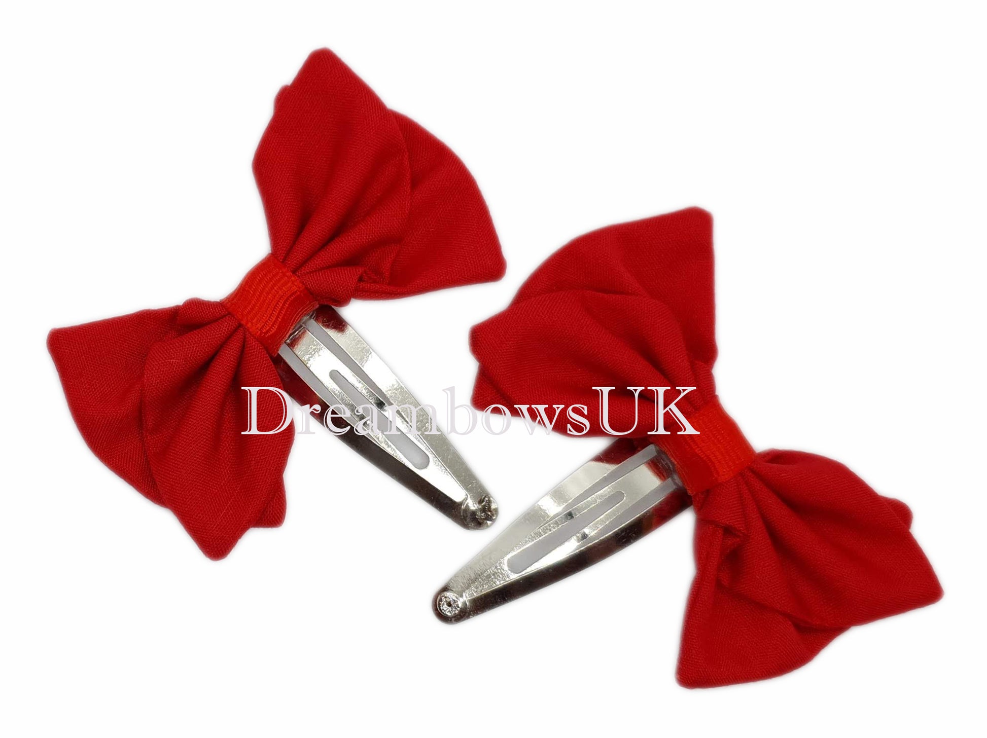 Handmade red school bows on snap clips