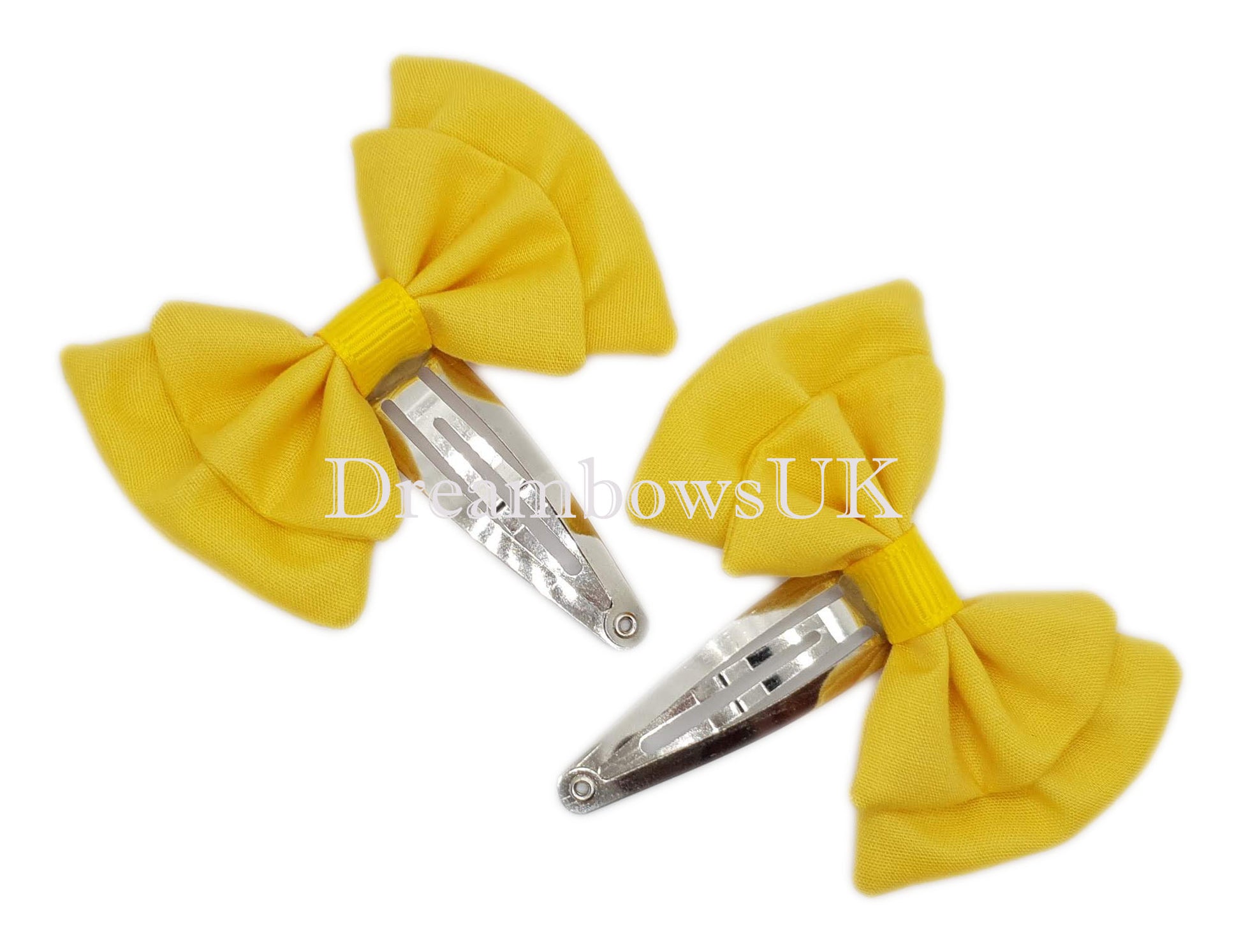 Golden yellow hair bows on snap clips